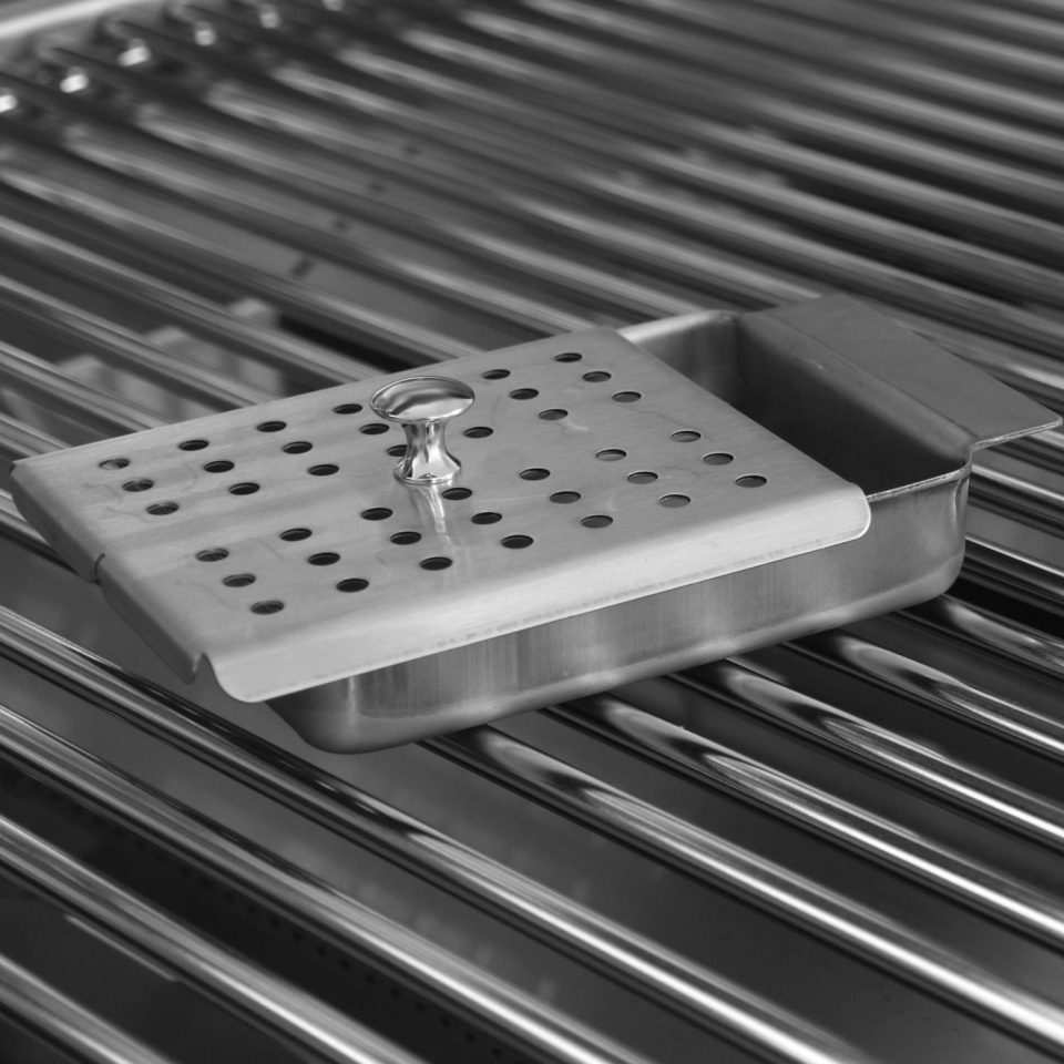 Close-up of Lion Premium Grill stainless steel smoker box and cooking grates