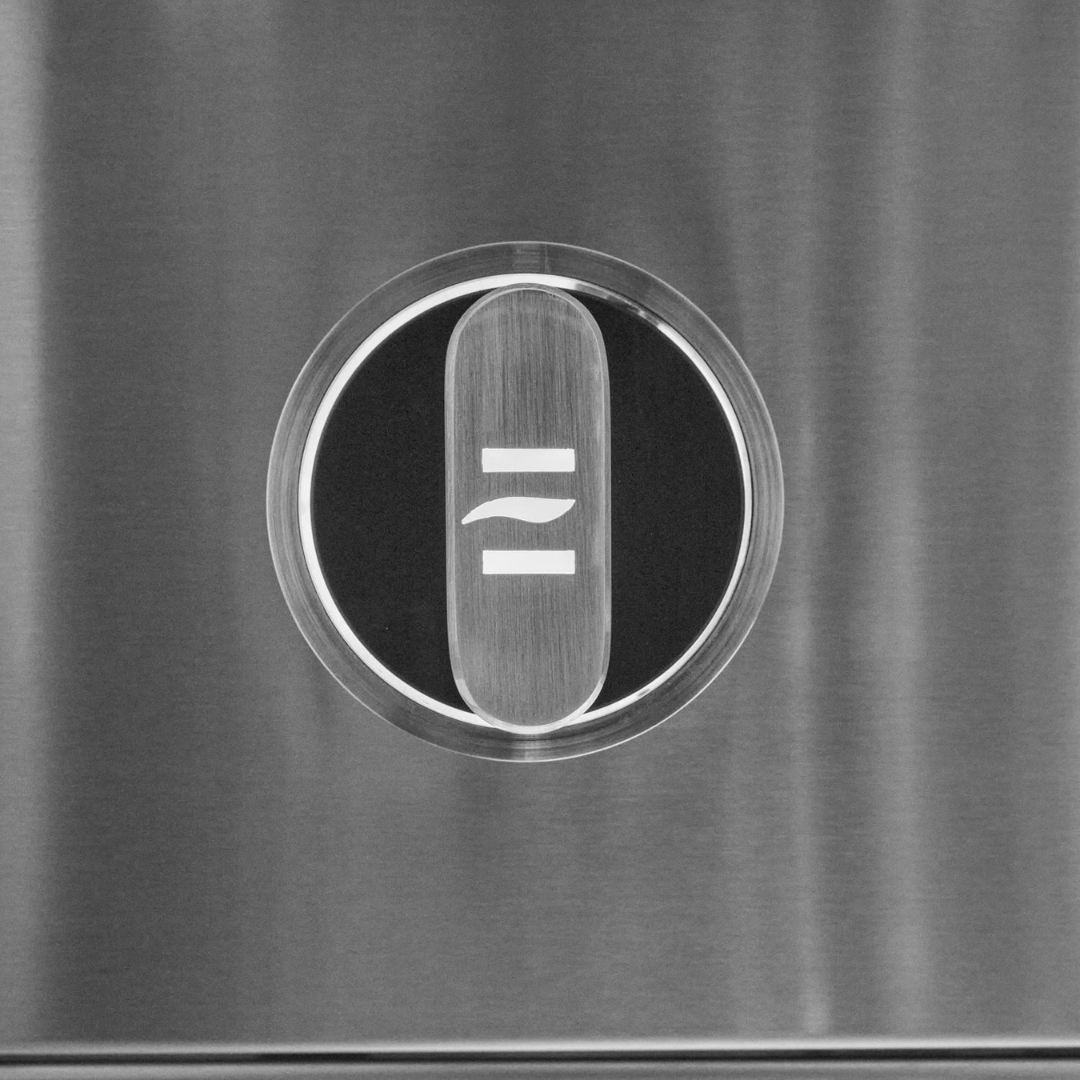 Backlit knob detail on Coyote CL-Series grill, featuring precision stainless steel bezel and enhanced visibility.