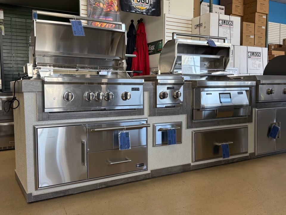 Coyote Grills outdoor kitchen display with built-in Coyote gas grill, side burner, and storage drawers — a top choice for the best Coyote grill setups.