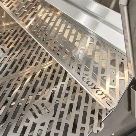 Coyote SL-Series built-in grill showing precision knobs and stainless steel body, featured in Best of Backyard’s Coyote product lineup.