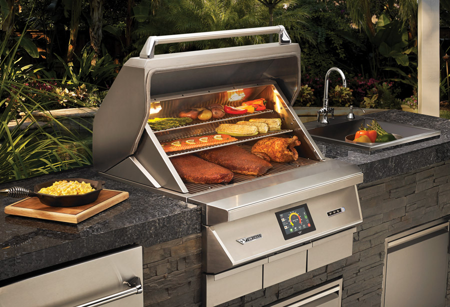 Twin Eagles built-in pellet grill cooking multiple foods in a luxury outdoor kitchen island, highlighting real-world performance and premium value.