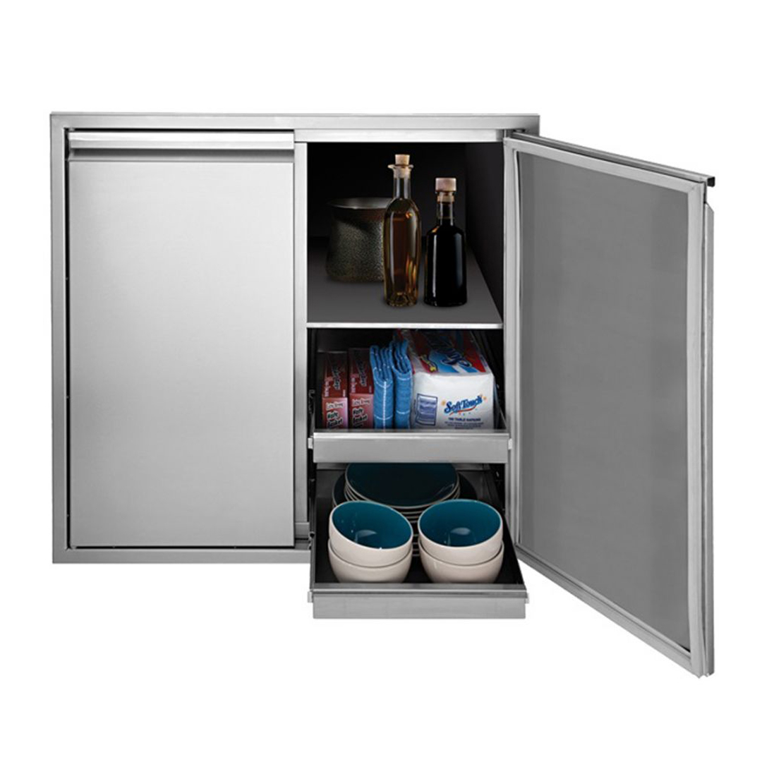Twin Eagles tall dry storage cabinet with shelves and pull-out drawers stocked with kitchen items.