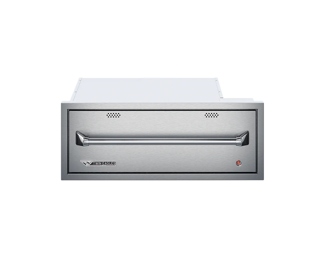 Twin Eagles 30-inch outdoor warming drawer in stainless steel with a concealed thermostat control.