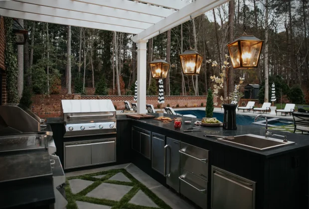 Luxury outdoor kitchen island with built in Twin Eagles grill and appliances