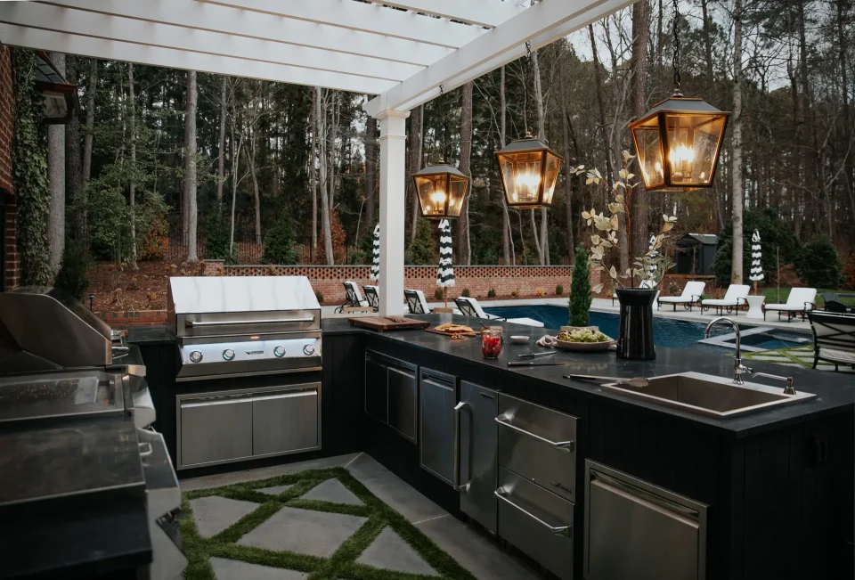 Luxury outdoor kitchen island with built in Twin Eagles grill and appliances