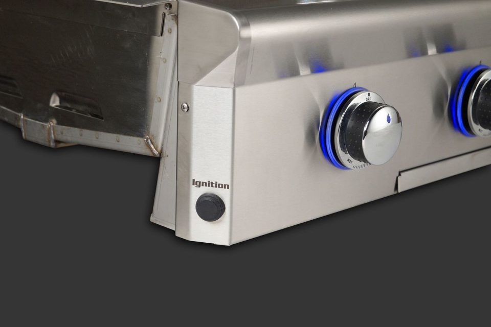 AOG L-Series built in grill with rotisserie and illuminated control knobs installed in a premium outdoor kitchen