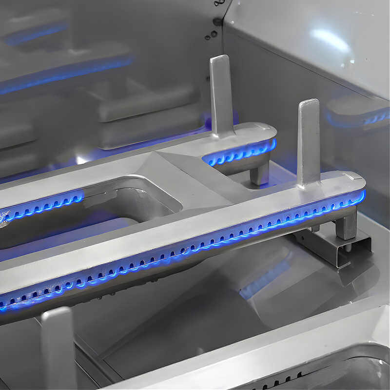 Cast stainless H-burner inside Fire Magic grill