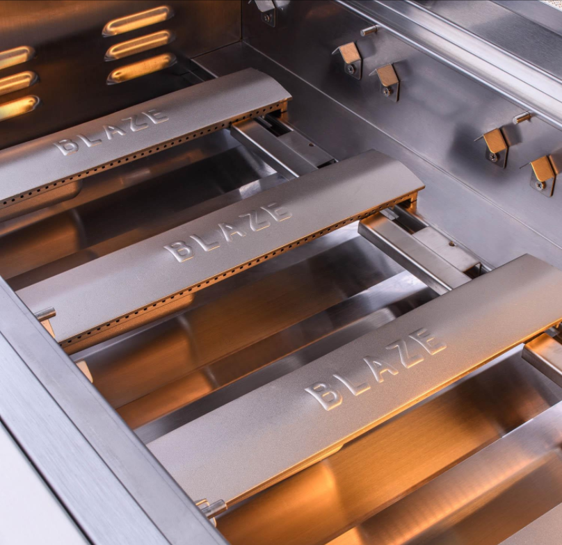 Linear cast burners inside Blaze grill