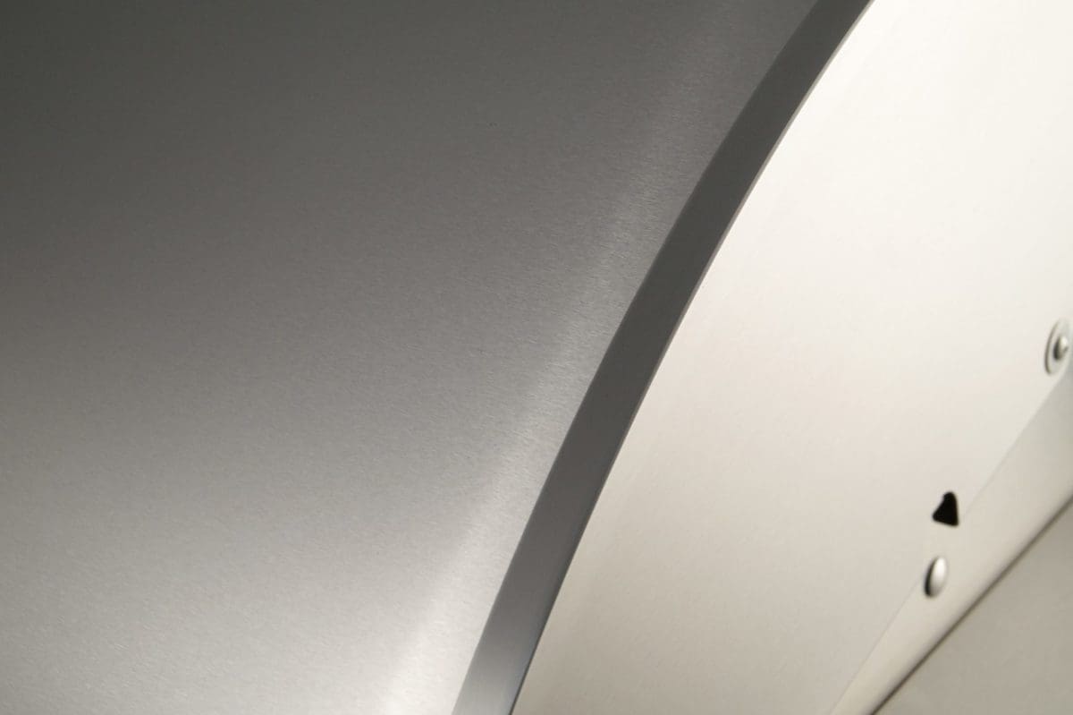 Seamless brushed stainless steel hood on AOG Grill.