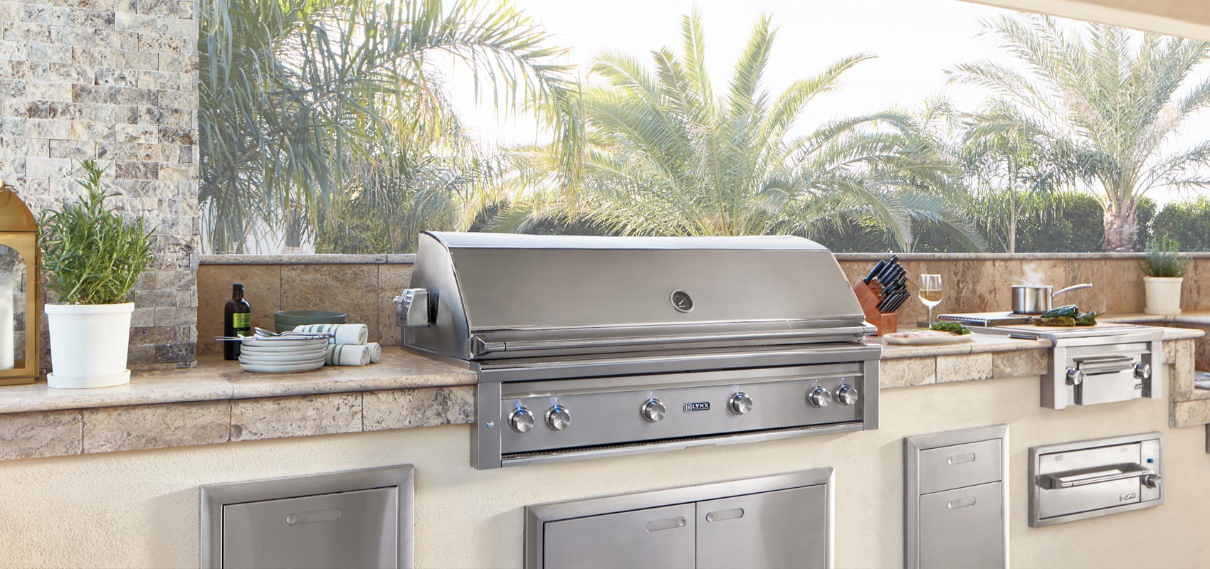 Lynx built-in grill in luxury outdoor kitchen with stainless steel finish — a top example of high end BBQ grills