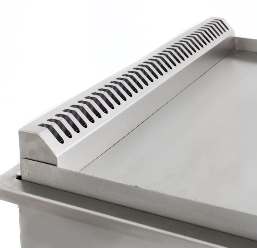 Close-up of a clean stainless steel griddle surface from a Blaze 30-inch built-in model.