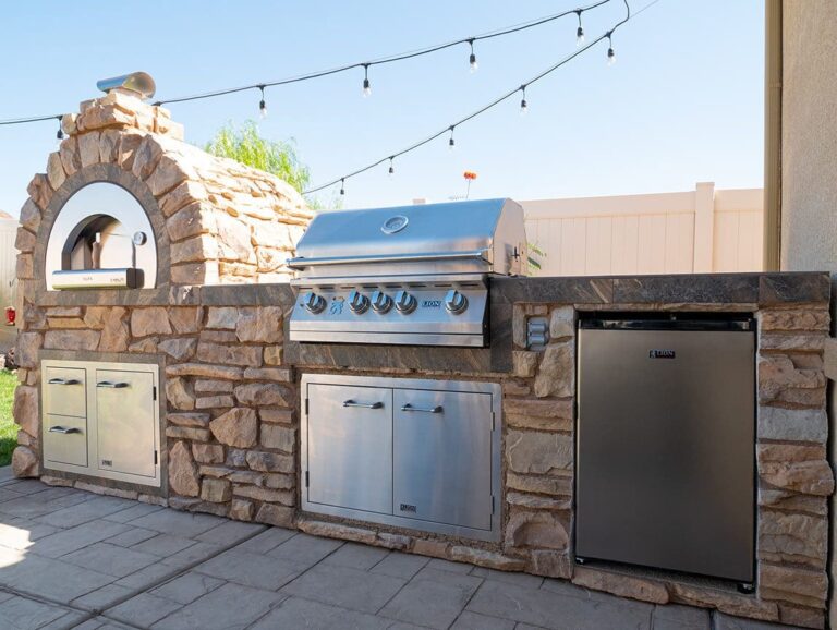 Lion L75000 grill built into a custom stone BBQ island