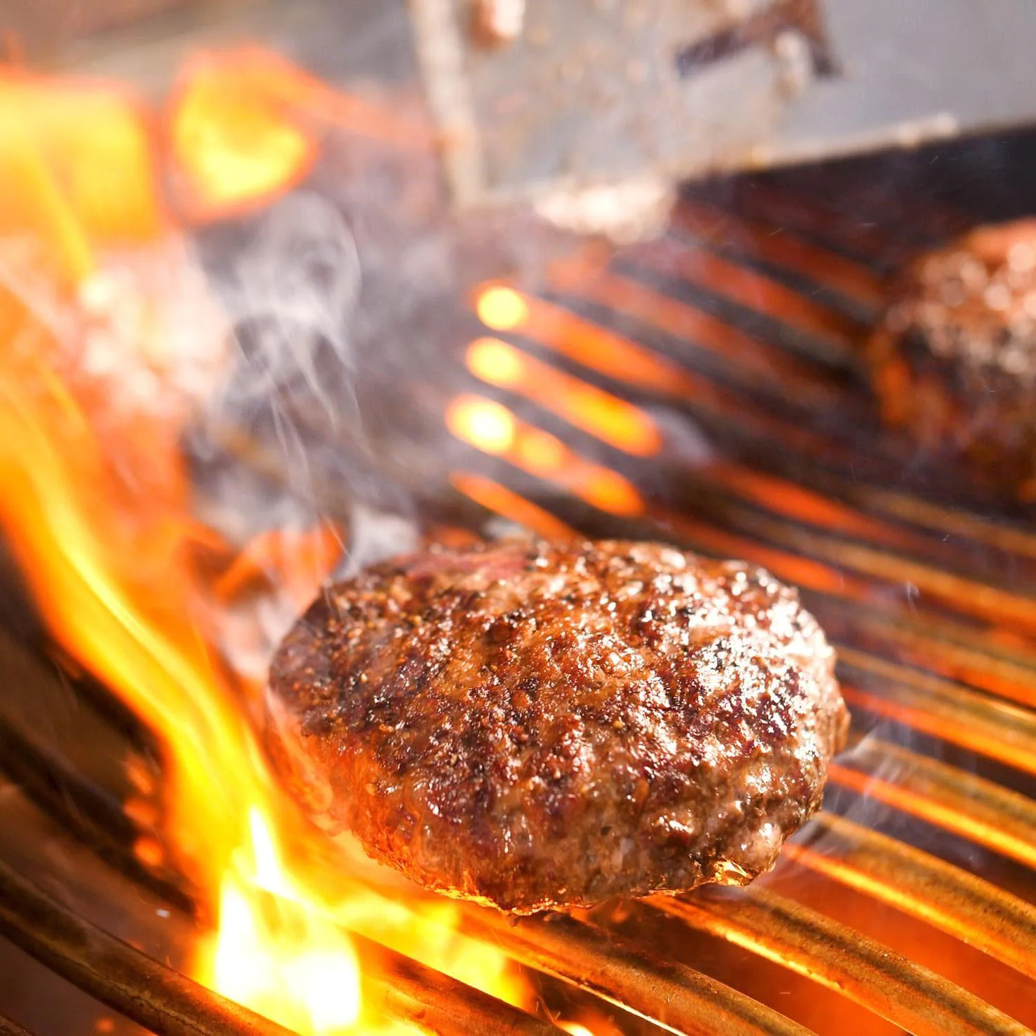 Meat cooking on Napoleon PRO grill