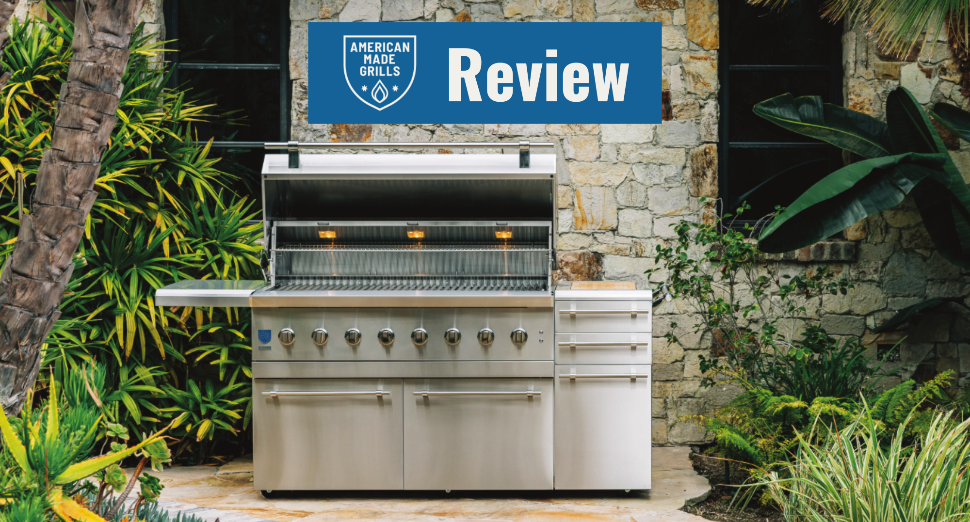 American Made Grills review featuring a luxury stainless steel outdoor grill in a landscaped backyard setting
