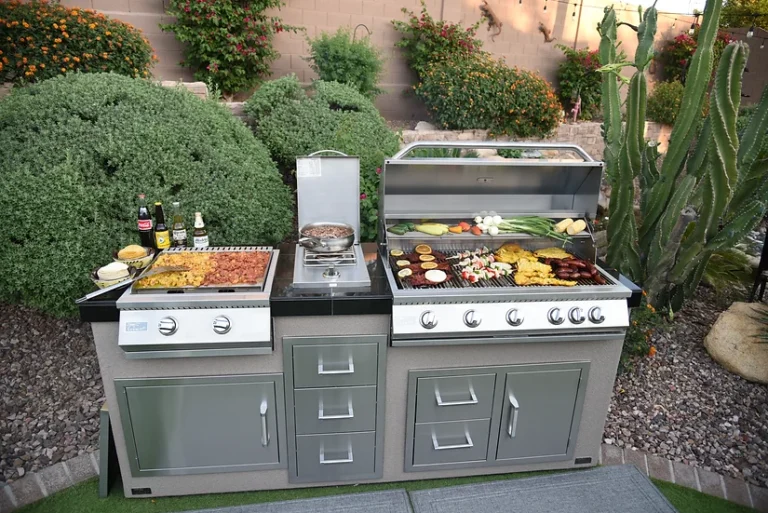 KoKoMo built in grill island with Teppanyaki griddle, power burner, and outdoor kitchen drawers