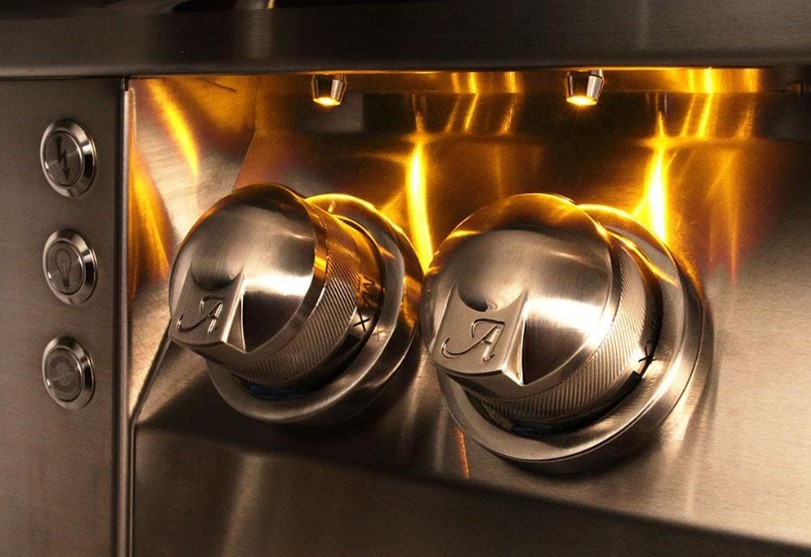 Close-up of Alfresco grill knobs with Precision-Point™ LED lighting and stainless steel design