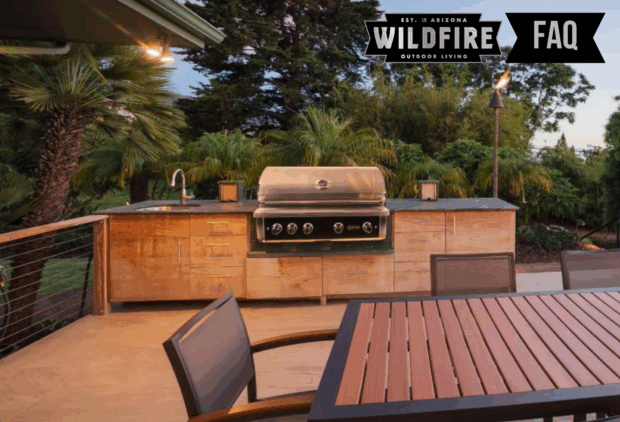 Wildfire Grills FAQ featured image showing premium outdoor kitchen island with Wildfire built-in grill under palm trees