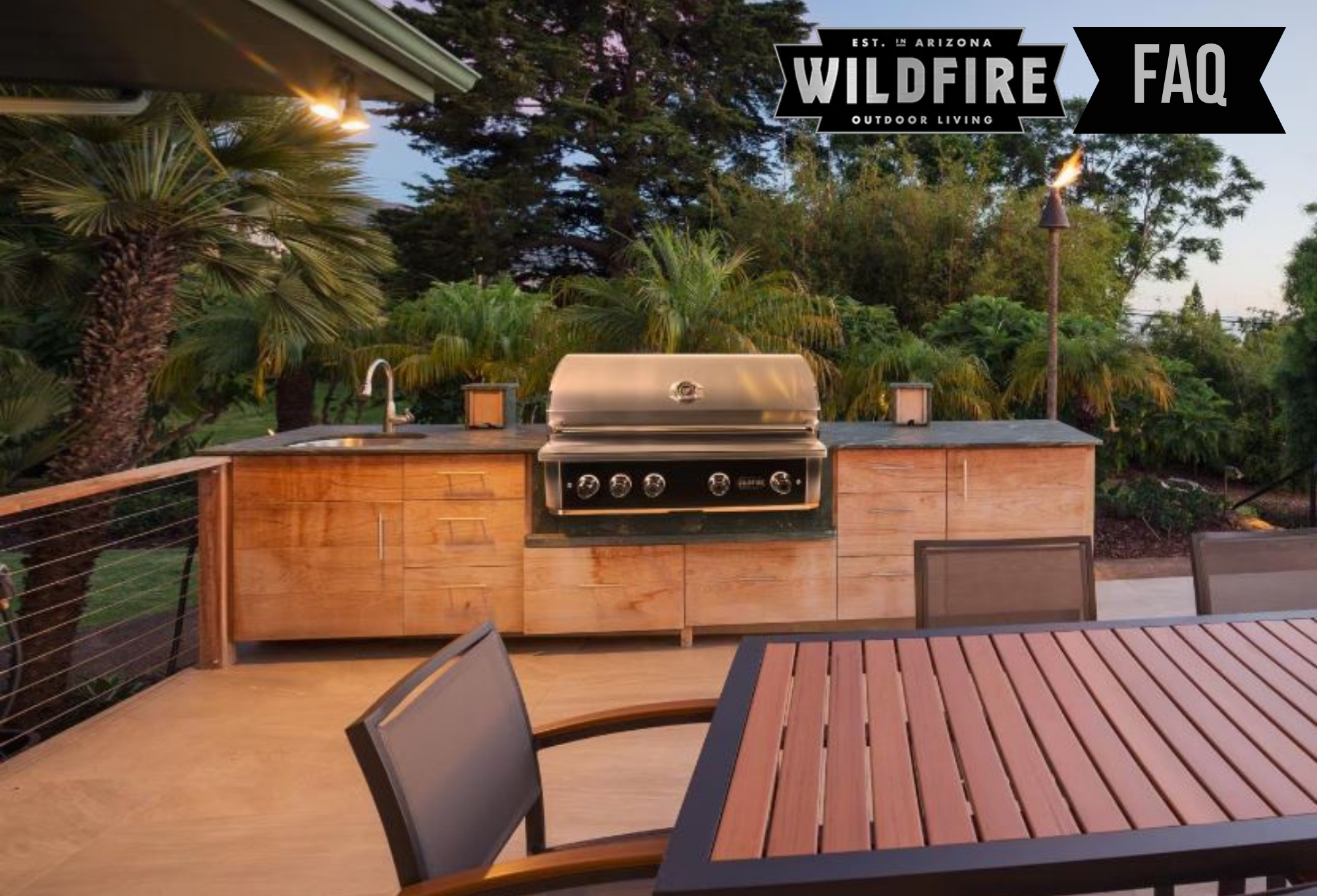 Wildfire Grills FAQ featured image showing premium outdoor kitchen island with Wildfire built-in grill under palm trees